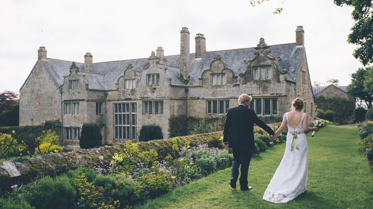A couple on the long walk overlooking the house